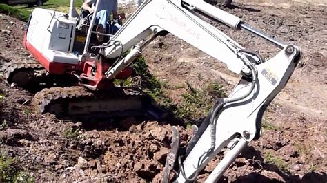 mini excavator steep slope|mini ex drive up slope.